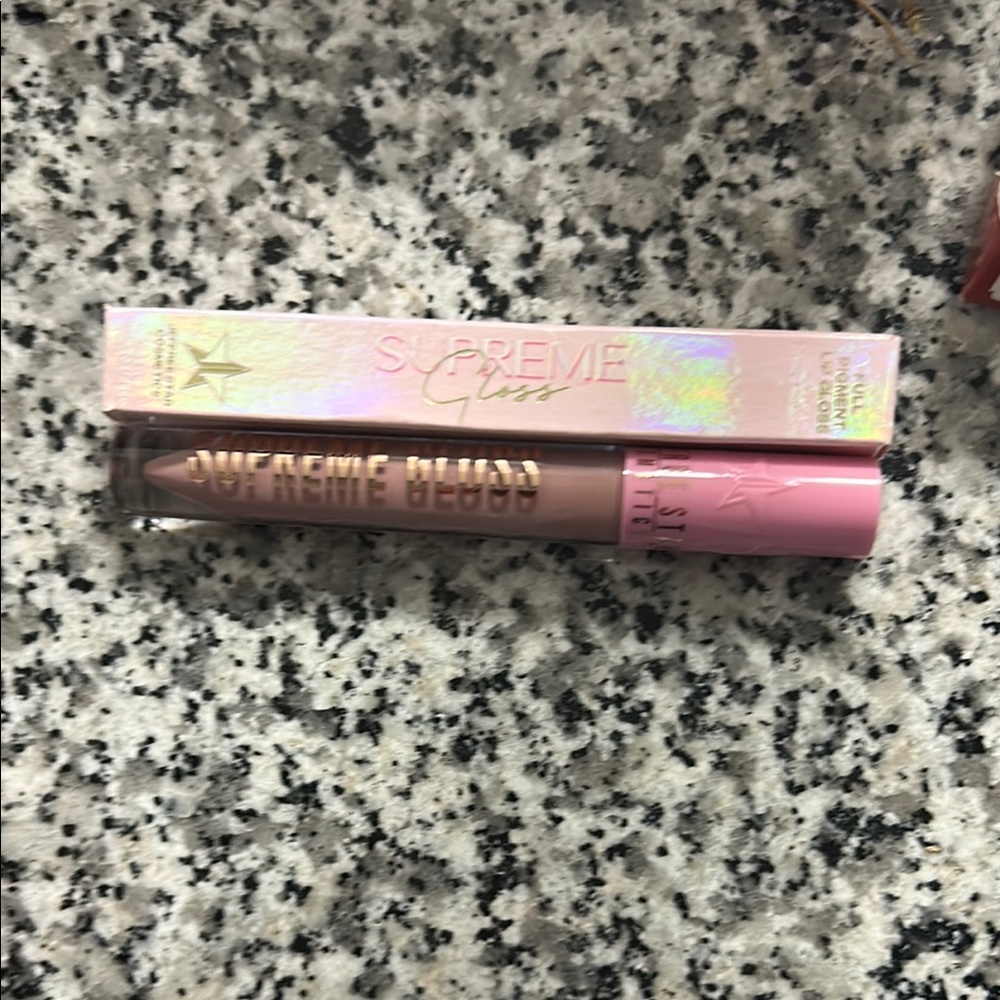 BNIB. JEFFREE STAR COSMETICS SUPREME GLOSS IN SHADE “BLOWIN MY CANDLES”